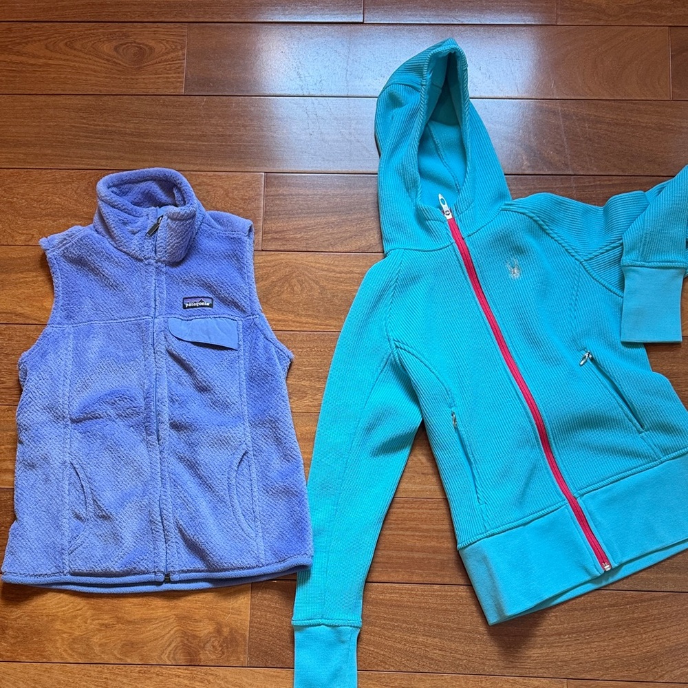 Patagonia purple vest size small and Spyder blue jacket size small